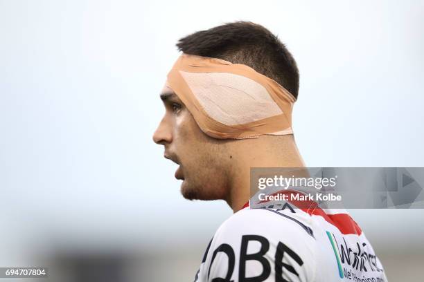 Ryan Matterson of the Roosters watches on during the round 14 NRL match between between the Wests Tigers and the Sydney Roosters at Campbelltown...