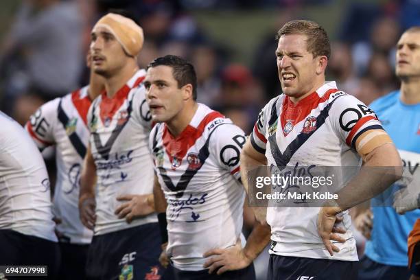 Mitchell Aubusson of the Roosters looks dejected after a Tigers try during the round 14 NRL match between between the Wests Tigers and the Sydney...