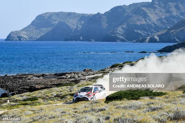 Juho Hanninen of Finland and co-driver Kaj Lindstrom of Finland drive their Toyota Yaris WRC during the race at Argentiera, near Alghero, on the...