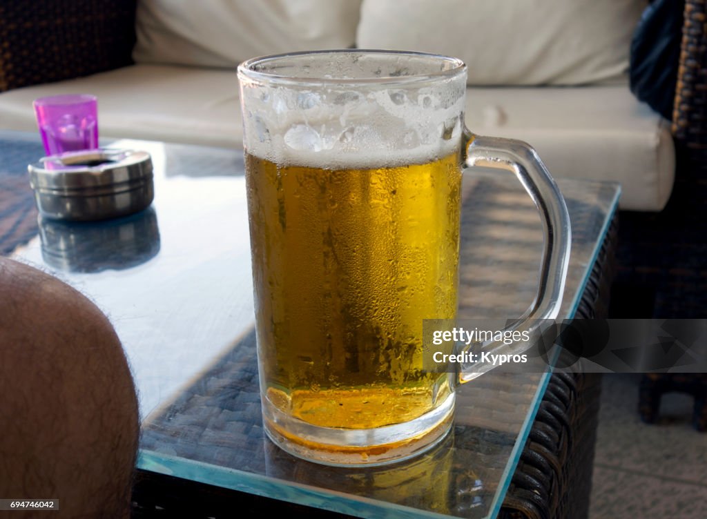 Europe, Greece, Rhodes Island, Faliraki Beach, View Of Cold Beer Mug With Frosty Glass