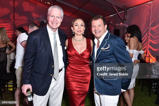 Steve Christianson, Helena Christianson and Rocco Ancarola attend the 21st Annual Hamptons Heart Ball at Southampton Arts Center on June 10, 2017 in...