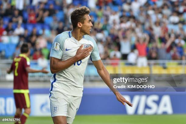 England's forward Dominic Calvert-Lewin celebrates a goal during the U-20 World Cup final football match between England and Venezuela in Suwon on...