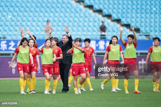 Head coach Bruno Bini and players of China thank supporters after winning the Friendly International Women 2017 between China and Finland at...