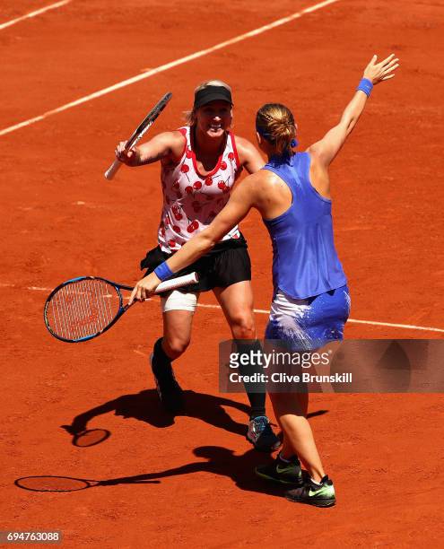 Winners, Bethanie Mattek-Sands of The United States and Lucie Safarova of The Czech Republic celebrate victory following the ladies doubles final...