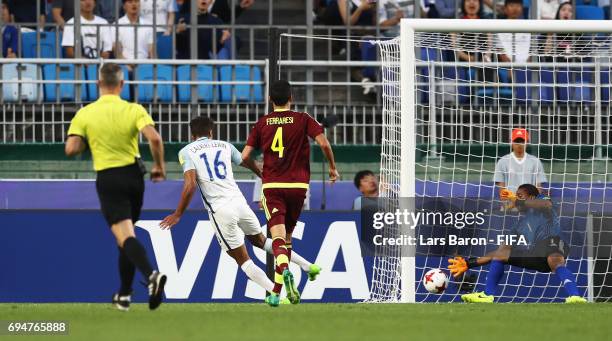 Dominic Calvert-Lewin of England scores their first goal past goalkeeper Wuilker Farinez of Venezuela during the FIFA U-20 World Cup Korea Republic...