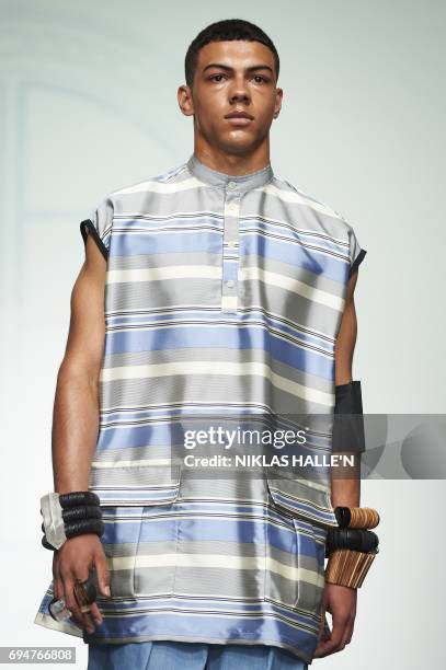 Model presents a creation by Danish-born designer Astrid Andersen during her catwalk show at London Fashion Week Men's June 2017 in London on June...