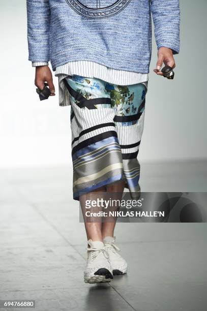 Model presents a creation by Danish-born designer Astrid Andersen during her catwalk show at London Fashion Week Men's June 2017 in London on June...