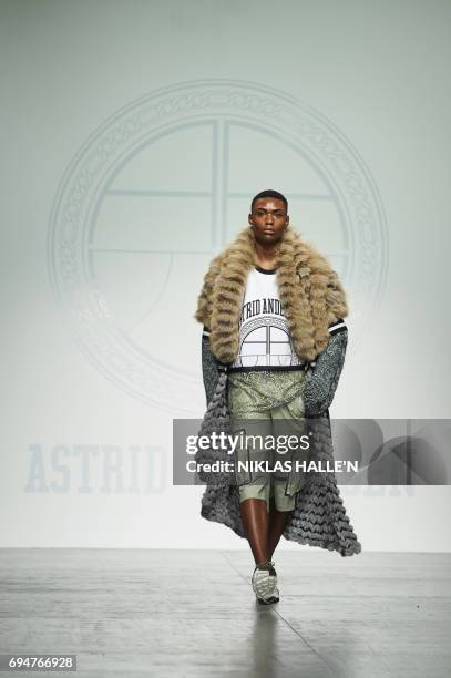 Model presents a creation by Danish-born designer Astrid Andersen during her catwalk show at London Fashion Week Men's June 2017 in London on June...