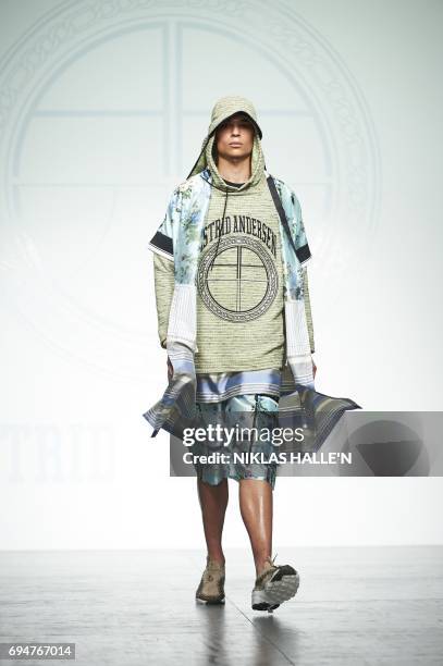 Model presents a creation by Danish-born designer Astrid Andersen during her catwalk show at London Fashion Week Men's June 2017 in London on June...