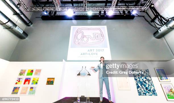 Auctioneer Gabriel Butu conducts the live auction at the Angel Art Fundraiser Hosted by Project Angel Food at NeueHouse Los Angeles on June 10, 2017...