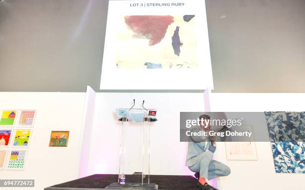 Auctioneer Gabriel Butu conducts the live auction at the Angel Art Fundraiser Hosted by Project Angel Food at NeueHouse Los Angeles on June 10, 2017...