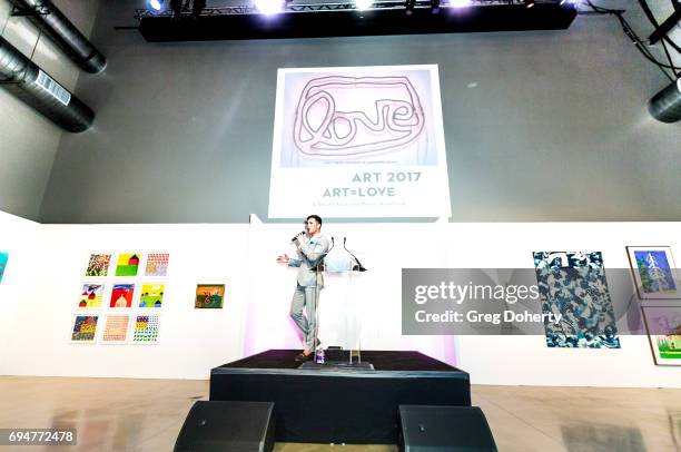 Auctioneer Gabriel Butu conducts the live auction at the Angel Art Fundraiser Hosted by Project Angel Food at NeueHouse Los Angeles on June 10, 2017...