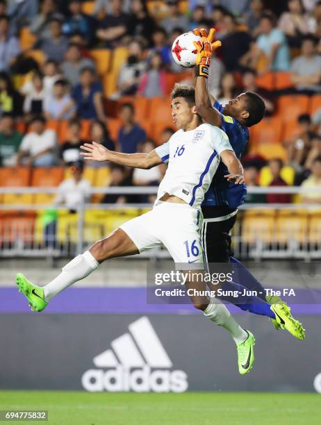 Dominic Calvert-Lewin of England jumps with goalkeeper Wuilker Farinez of Venezuela during the FIFA U-20 World Cup Korea Republic 2017 Final between...