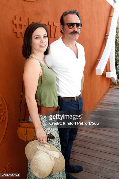 Nathalie Pechalat and her companion actor Jean Dujardin attend the Men Final of the 2017 French Tennis Open - Day Fithteen at Roland Garros on June...