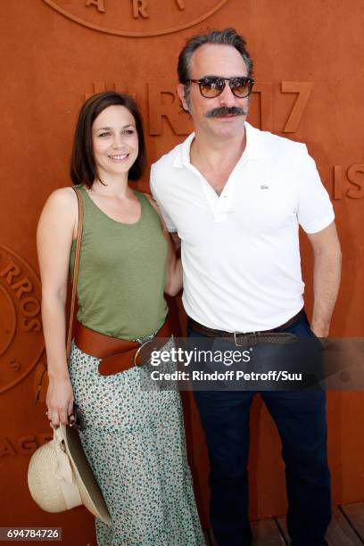 Nathalie Pechalat and her companion actor Jean Dujardin attend the Men Final of the 2017 French Tennis Open - Day Fithteen at Roland Garros on June...