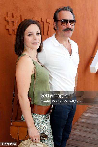 Nathalie Pechalat and her companion actor Jean Dujardin attend the Men Final of the 2017 French Tennis Open - Day Fithteen at Roland Garros on June...