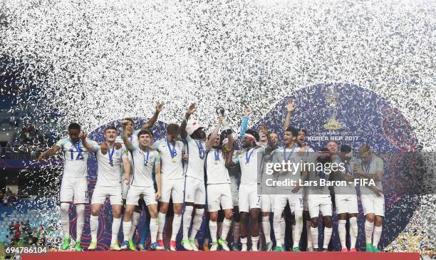 Captain Lewis Cook of England lifts the trophy in victory with team mates after the FIFA U-20 World Cup Korea Republic 2017 Final between Venezuela...