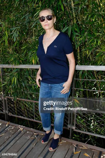 Actress Emmanuelle Beart attends the Men Final of the 2017 French Tennis Open - Day Fithteen at Roland Garros on June 11, 2017 in Paris, France.