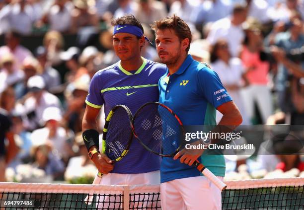 Rafael Nadal of Spain and Stan Wawrinka of Switzerland pose for photos prior to their mens singles final on day fifteen of the 2017 French Open at...