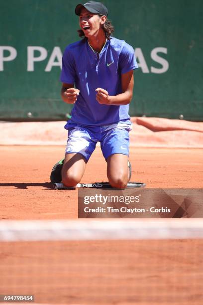 French Open Tennis Tournament - Day Fourteen. Alexei Popyrin of Australian celebrates after defeating Nicola Kuhn of Spain to win the Boy's Singles...