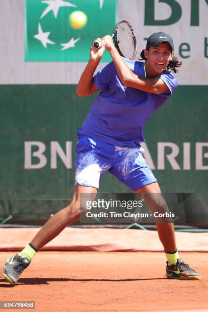 French Open Tennis Tournament - Day Fourteen. Alexei Popyrin of Australian defeating Nicola Kuhn of Spain to win the Boy's Singles Final match on...