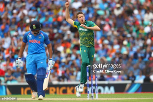 Morne Morkel of South Africa celebrates the wicket of Rohit Sharma of India during the ICC Champions trophy cricket match between India and South...