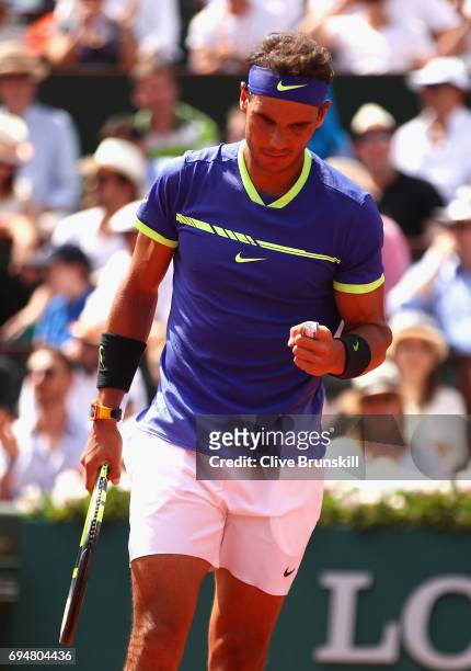 Rafael Nadal of Spain celebrates a point during the mens singles final match against Stan Wawrinka of Switzerland on day fifteen of the 2017 French...