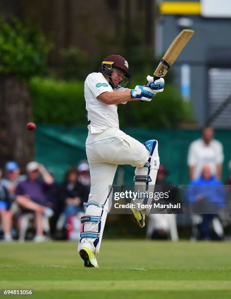 Scott Borthwick of Surrey bats during the Specsavers County Championship: Division One match between Surrey and Essex at Guildford Cricket Club on...