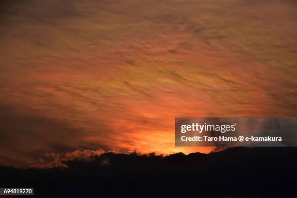 brocken spectre and glory of evening sun - brockengespenst stock-fotos und bilder
