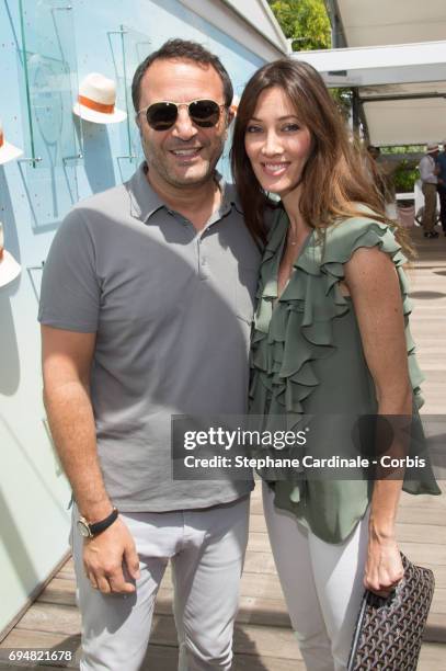 Arthur and his companion Mareva Galanter attend the French Tennis Open 2017 - Day Fifthteen at Roland Garros on June 11, 2017 in Paris, France.