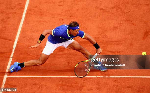 Rafael Nadal of Spain plays a backhand during the mens singles final match against Stan Wawrinka of Switzerland on day fifteen of the 2017 French...