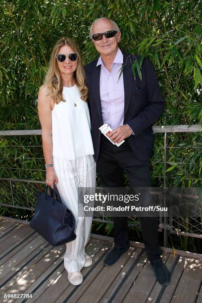 Chairman & Chief Executive Officer of L'Oreal Jean-Paul Agon and his wife Sophie attend the Men Final of the 2017 French Tennis Open - Day Fithteen...