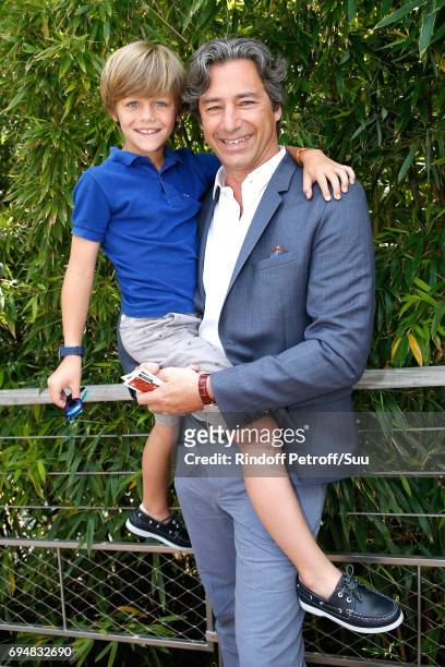 General Director of Facebook France, Laurent Solly and his son Marceau attend the Men Final of the 2017 French Tennis Open - Day Fithteen at Roland...