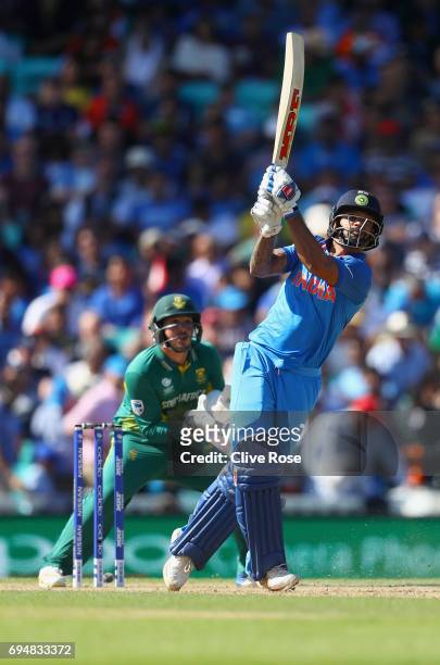 Shikhar Dhawan of India attempts to hit a six but is caught during the ICC Champions trophy cricket match between India and South Africa at The Oval...