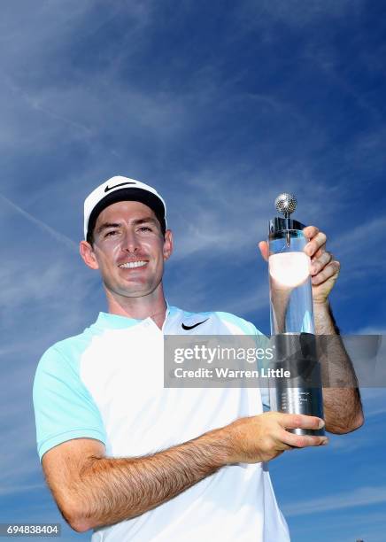 Dylan Frittelli of South Africa poses with the trophy after winning the Lyoness Open at Diamond Country Club on June 11, 2017 in Atzenbrugg, Austria.