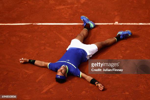 Rafael Nadal of Spain celebrates victory following the mens singles final against Stan Wawrinka of Switzerland on day fifteen of the 2017 French Open...
