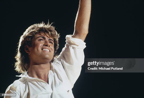 Singer-songwriter George Michael of Wham!, performing on stage during the pop duo's 1985 world tour, January 1985.'The Big Tour' took in the UK,...