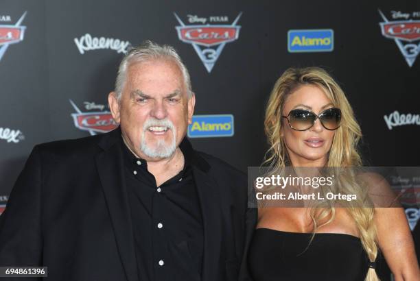 Actor John Ratzenberger and wife Julie Blichfeldt arrive for the Premiere Of Disney And Pixar's "Cars 3" held at Anaheim Convention Center on June...