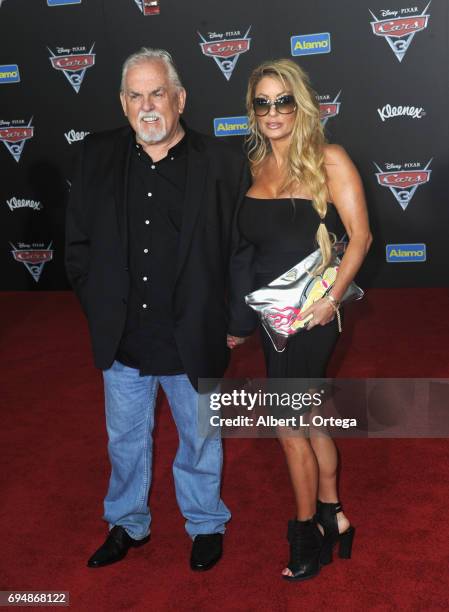 Actor John Ratzenberger and wife Julie Blichfeldt arrive for the Premiere Of Disney And Pixar's "Cars 3" held at Anaheim Convention Center on June...