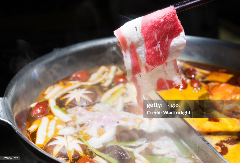 Put lamb into Chinese hot pot