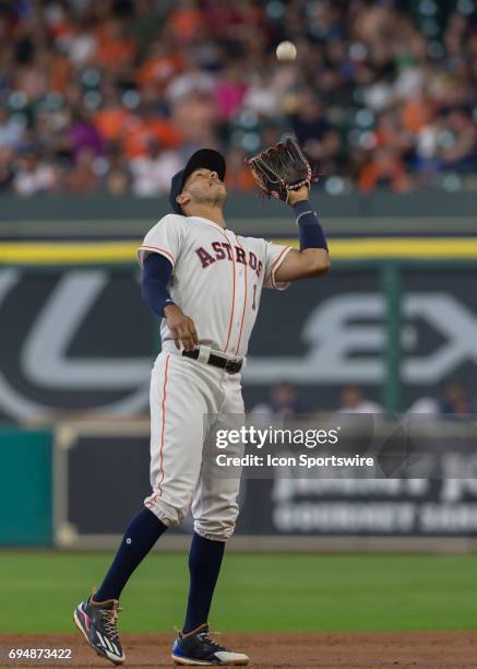 Houston Astros shortstop Carlos Correa catches a pop fly during the MLB game between the Los Angeles Angels and Houston Astros on June 10, 2107 at...