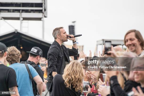 Rasmus Walter going to concert crowd during his performans on Northside Festival on June 11, 2017 in Aarhus, Denmark.