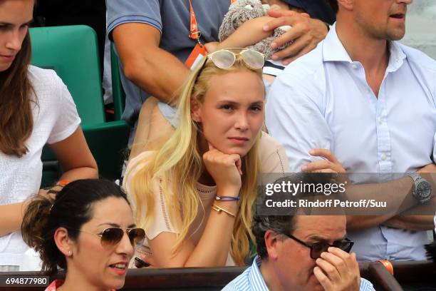 Stan Wawrinka's girlfriend Donna Vekic watches on from Court Philippe Chatrier during the mens singles final match between Rafael Nadal of Spain and...