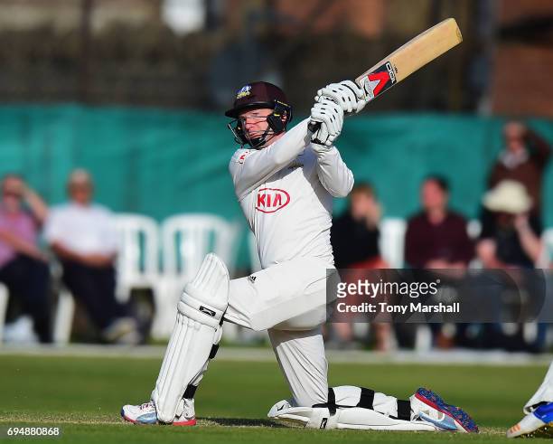 Gareth Batty of Surrey bats during the Specsavers County Championship: Division One match between Surrey and Essex at Guildford Cricket Club on June...