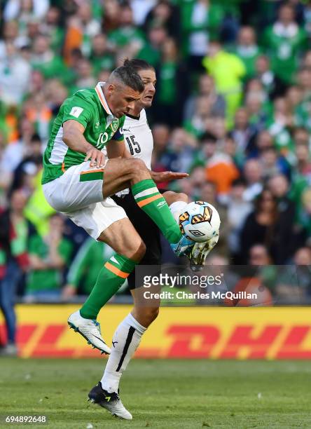 Jon Walters of Republic of Ireland and Sebastian Prodi of Austria during the FIFA 2018 World Cup Qualifier between Republic of Ireland and Austria at...