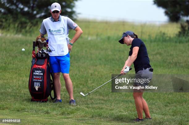 Lindy Duncan of the USA chips onto the 1st green during the final round of the Manulife LPGA Classic at Whistle Bear Golf Club on June 11, 2017 in...