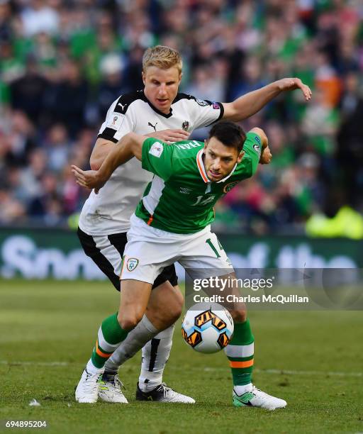 Wes Hoolahan of Republic of Ireland and Martin Hinteregger of Austria during the FIFA 2018 World Cup Qualifier between Republic of Ireland and...