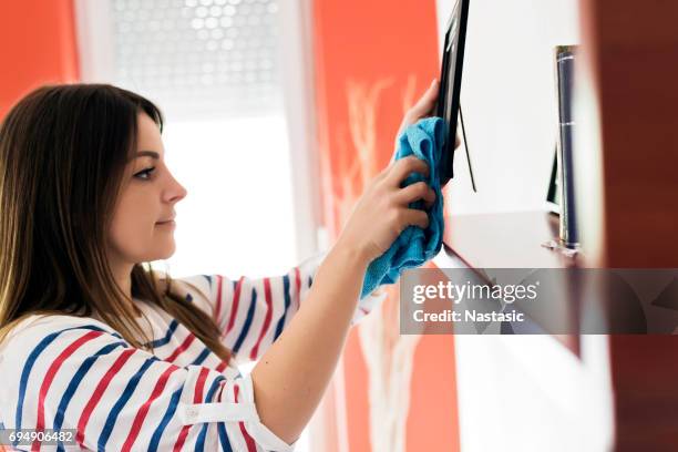 house dusting - homemaker stock pictures, royalty-free photos & images