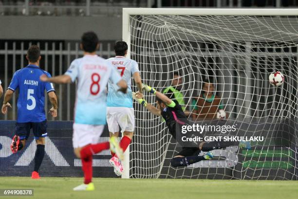 Kosovo's goalkeeper Samir Ujkani fails to make a save during the FIFA World Cup 2018 qualification football match between Kosovo and Turkey at Loro...