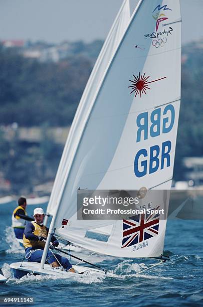 English sailor Ben Ainslie competes for Great Britain to finish in first place to win the gold medal in the Laser class open single person dinghy...
